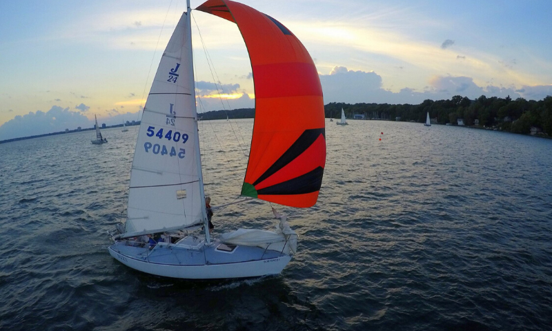adult sailing on Kempenfelt Bay in Barrie Ontario